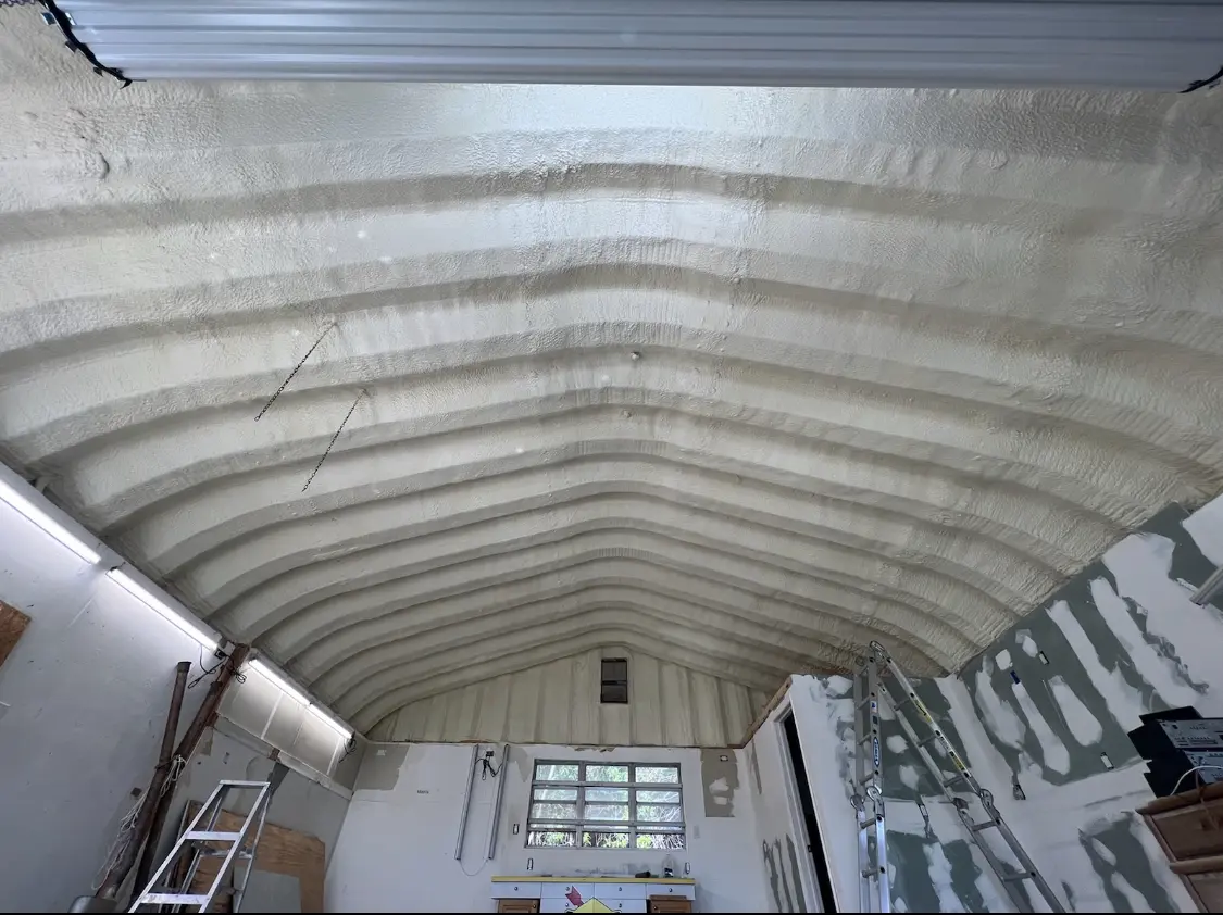 Spray polyurethane foam applied to the underside of a metal roof deck in Wailuku